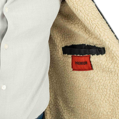 Schwarze, schmal geschnittene Bikerjacke für Herren im Lammfell-Look aus echtem Leder mit Rindway-Schnallenkragen